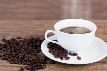 Coffee cup and saucer on a wooden table