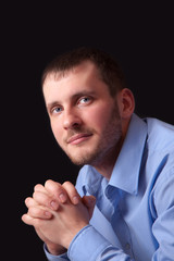 Fashion young man in blue shirt