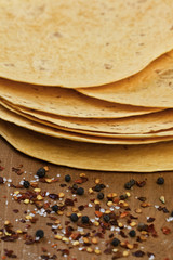 stack of tortillas and spices