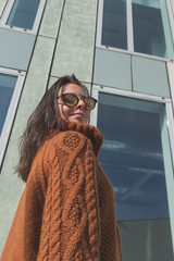 Beautiful girl posing in an urban context