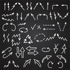 Hand drawn arrows icons set isolated on blackboard background