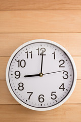 wall clock on wood