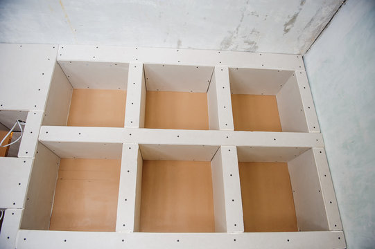 design of the drywall in the room apartment