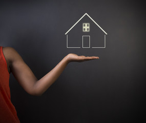 African American woman teacher with home house or real estate