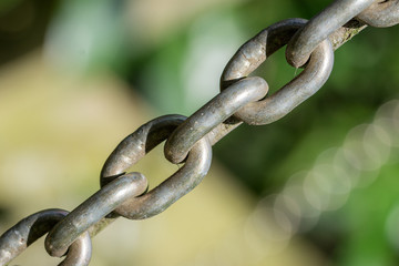 metal chain diagonally against blurred  background