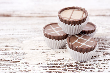 Dark chocolate on wooden background