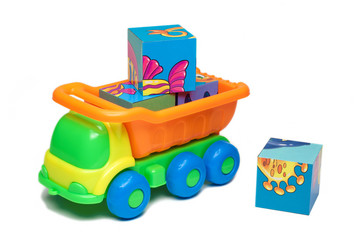 Toy truck carrying bricks