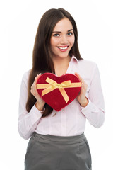 Fototapeta premium Woman holding heart-shaped box