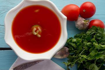 Tomato gazpacho in white dish