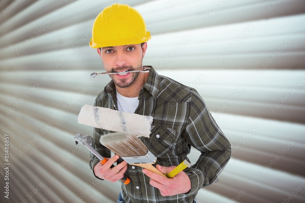 Aufkleber composite image of manual worker holding various tools