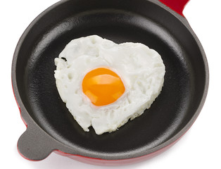 Heart Shaped Egg on Red Pan