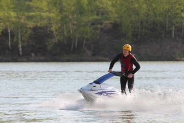 A man turn on the jet ski.