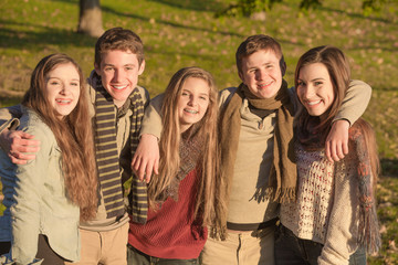 Group of Five Teens Embracing