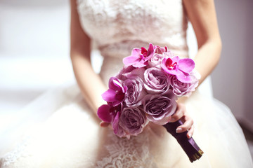 Orchid and roses wedding bouquet
