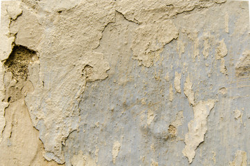 Mauer mit blau grau gelb Verputz
