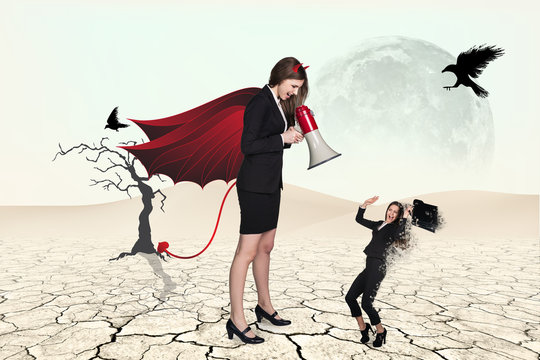 Devil businesslady with a megaphone screeming