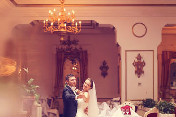 Bride and groom in a restaurant