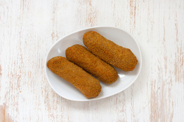 meat croquete on plate