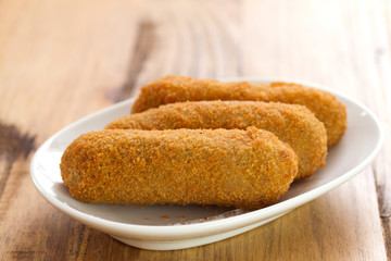 meat croquete on dish