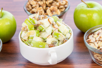 apple salad with almonds, walnuts and pumpkin seeds