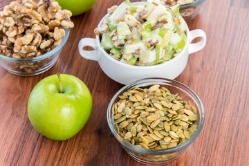 apple salad with almonds, walnuts and pumpkin seeds