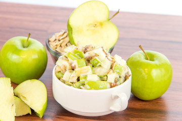 apple salad with almonds, walnuts and pumpkin seeds