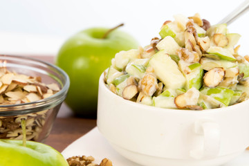 apple salad with almonds, walnuts and pumpkin seeds