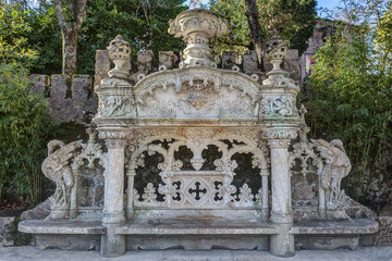 Fototapeta na wymiar bench in rococo style. Quinta Regaleira Sintra Portugal.