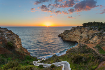 Beautiful sunset in beach Carvoeiro at sunset. Valle Currais.