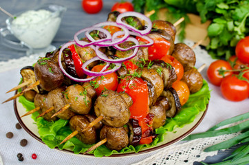 Grilled skewers of mushrooms and vegetables