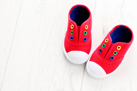 red baby shoes