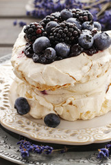 Pavlova cake with blueberries and blackberries