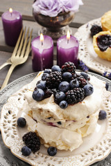 Pavlova cake with blueberries and blackberries