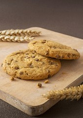 Chocolate chip cookies on a wooden board