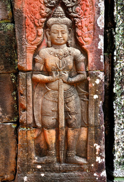 Bass relief wall carving in Angkor Wat, Siem Reap, Cambodia.