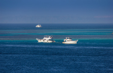  yacht on a background of blue sea