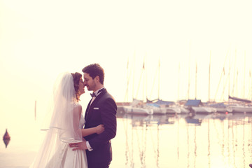 Portrait on a bride and groom in sunlight