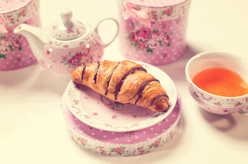 Croissant on floral decor