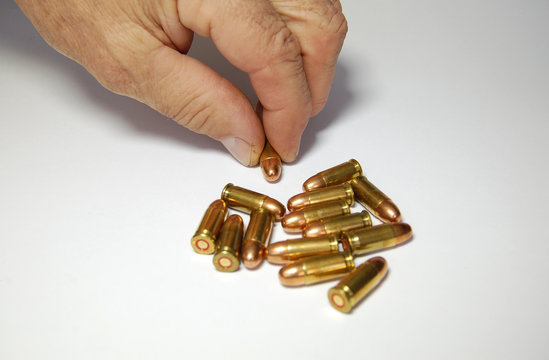 hand picking bullets