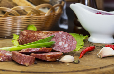 sausage on a wooden plate in a restaurant
