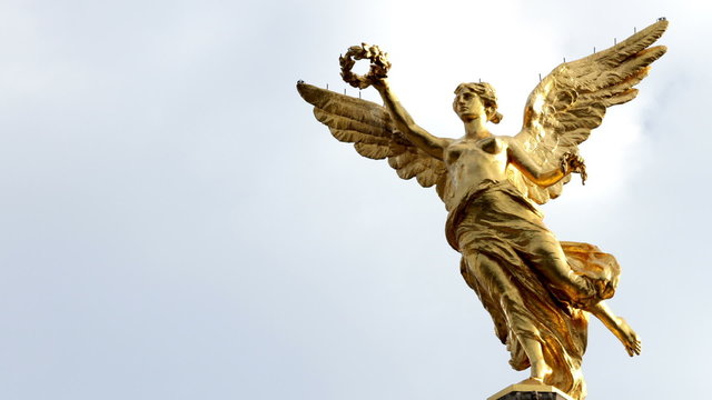 Time-lapse full body to monument called "Independence Angel". This touristic attraction is located in Reforma Avenue in Mexico City, is one of the most famous and representative mexican monuments