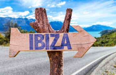 Ibiza wooden sign with road background