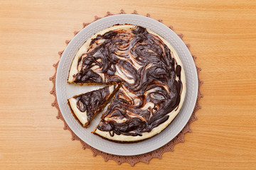 Domestic cheesecake with chocolate and raisins