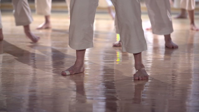 group of people practicing karate kata