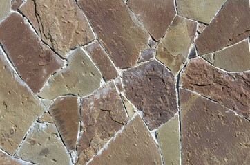 The wall consists of fragments of stones fitted together.