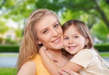 Obraz premium Mom. CLoseup portrait of happy white mother and young daughter