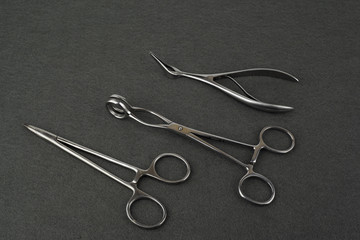 Surgical tool isolated on a gray background