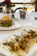 butternut squash ravioli with roasted walnuts, brown butter
