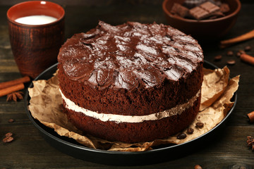 Delicious chocolate cake on table close-up