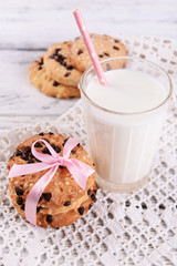 Obraz na płótnie Canvas Tasty cookies and glass of milk
